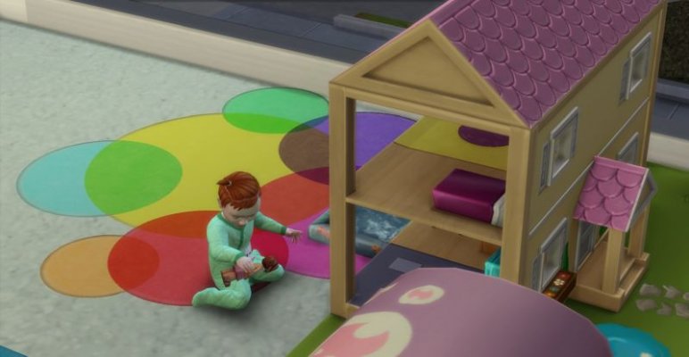 Säugling Mila spielen mit Puppenhaus 1.jpg
