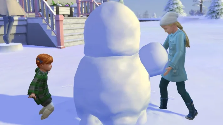 79 Annie und Ellie bauen einen Schneemann.webp